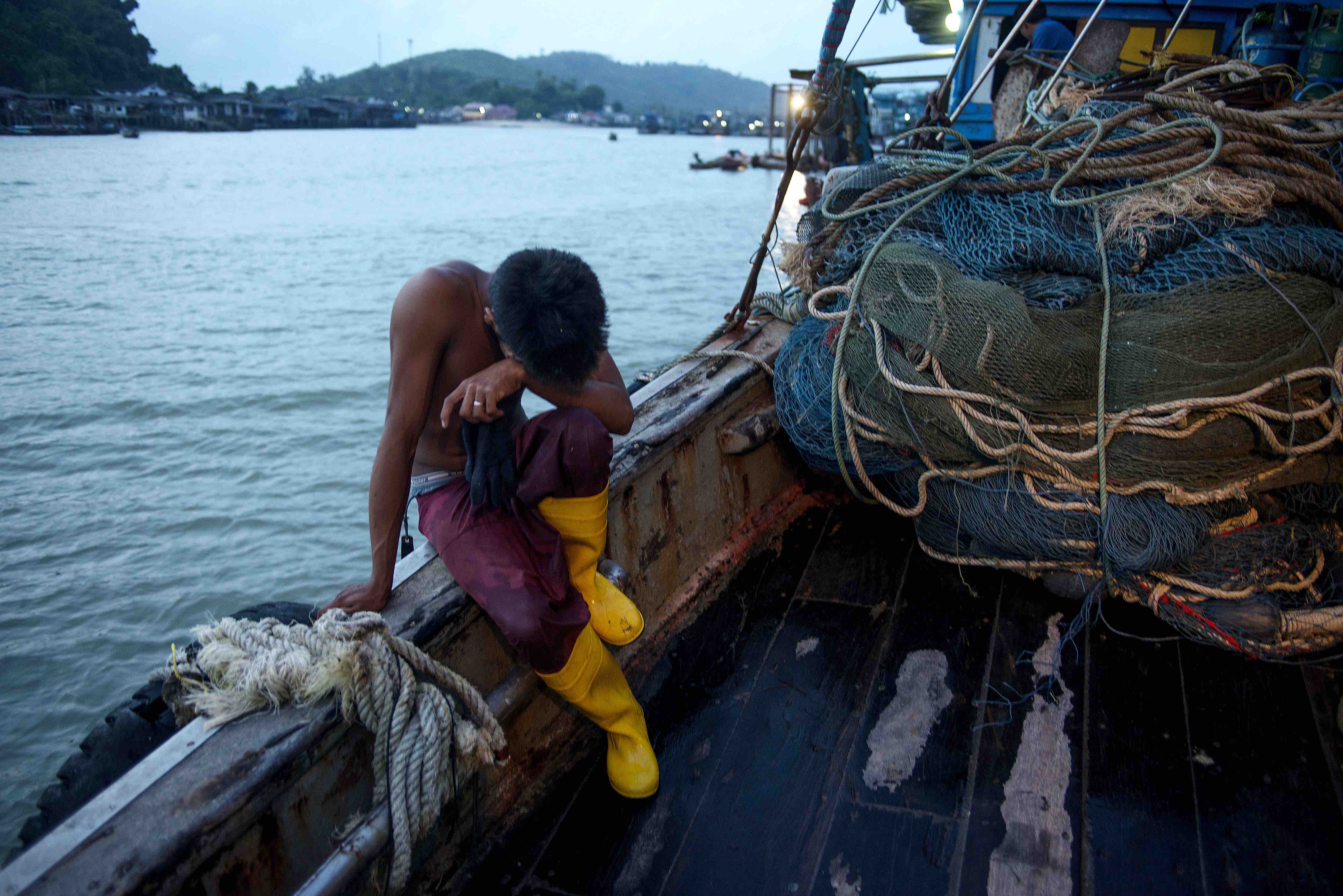 La pesca és una de les indústries en què es donen condicions d'esclavitud. A la imatge, un pescador a Tailàndia