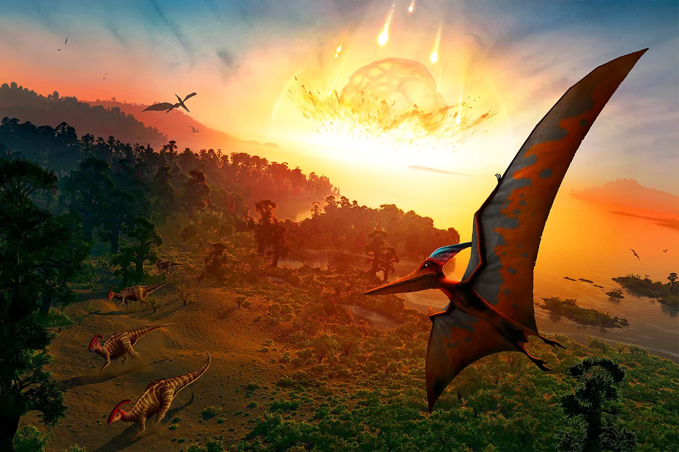 Recreació del moment abans de l’impacte del meteorit que va provocar la desaparició de la majoria d’espècies del planeta, entre els quals els parasaurolophus i els pteranodons de la imatge