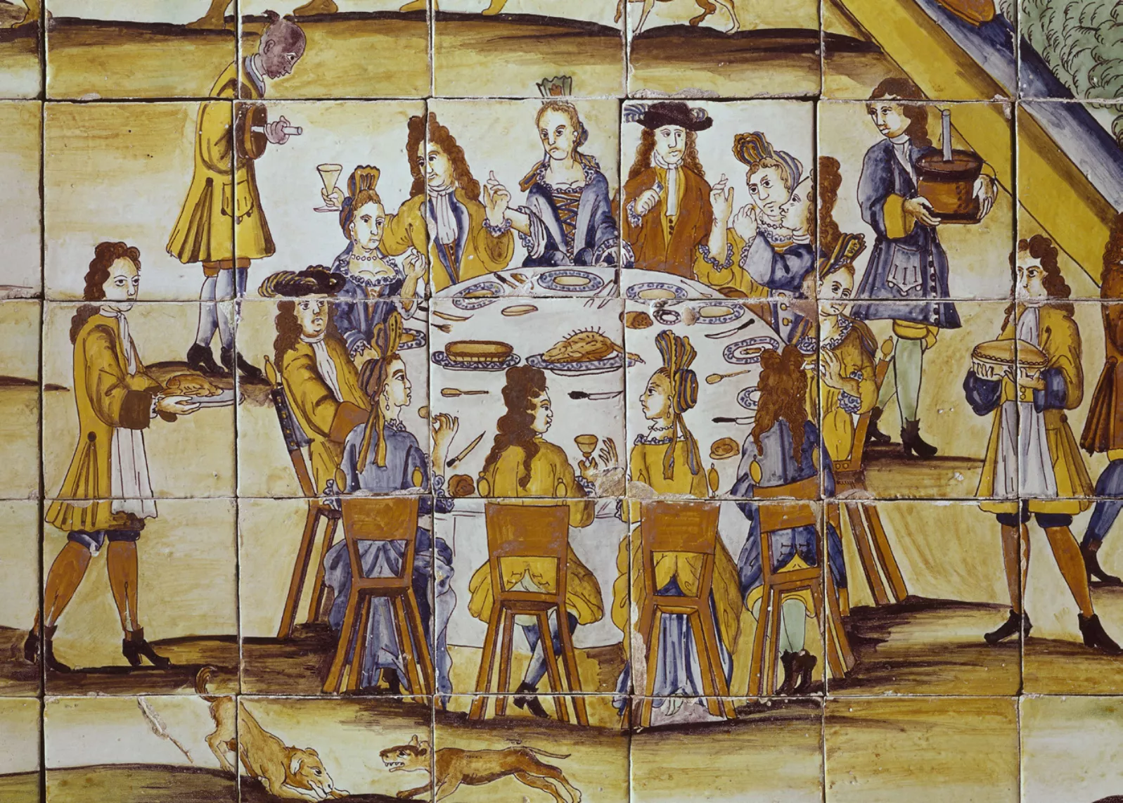 Escena d’un àpat en el panell de ceràmica 'La xocolatada' (1710), procedent d’Alella